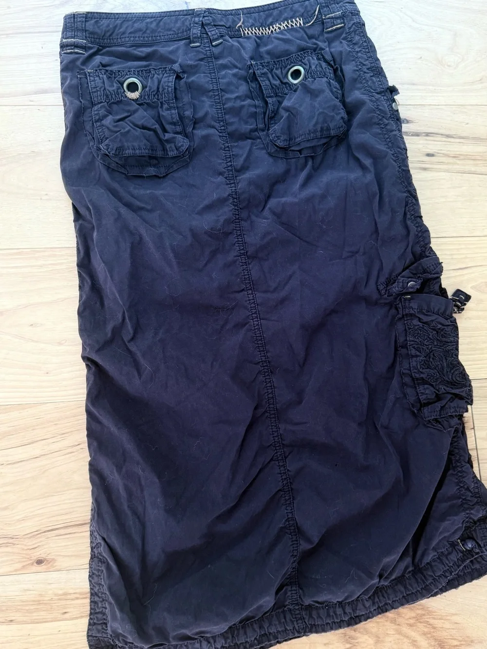 Pure Color Women’s dark brown utility midi skirt with unique details. Size 27.